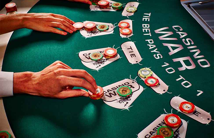 What are the odds of winning a Casino War hand?